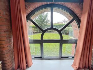 Arch window- click for photo gallery